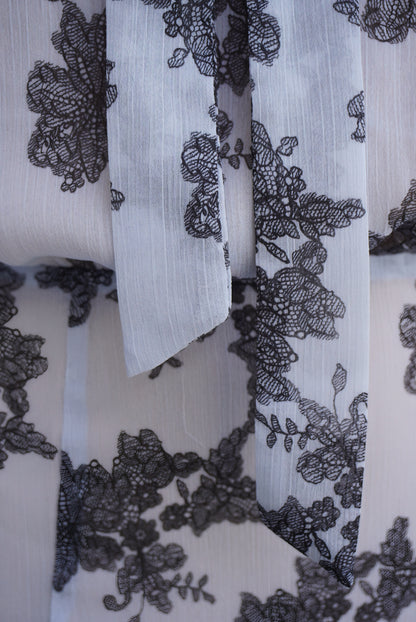 ROTATE. Vestido lazada al cuello