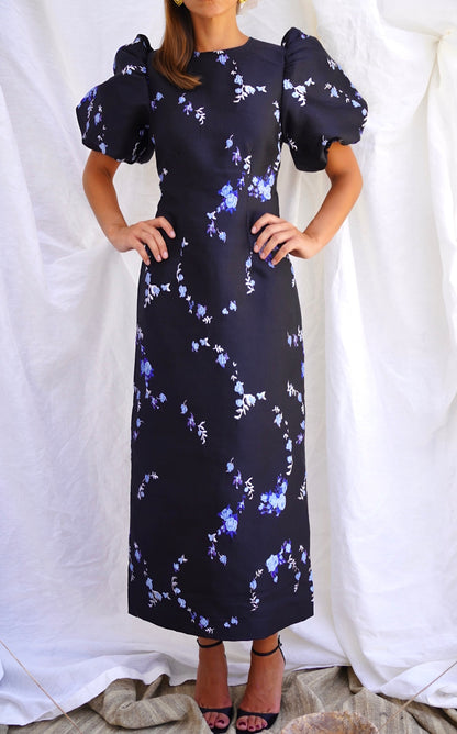 GANNI. Vestido midi en brocado con espalda abierta