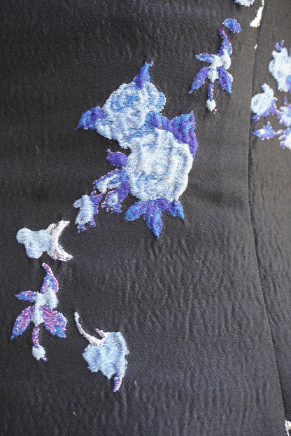 GANNI. Vestido midi en brocado con espalda abierta